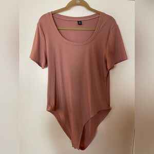 Elegant Mauve Ribbed Women's Bodysuit
